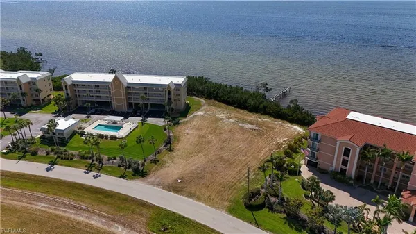 an aerial view of a house with outdoor space