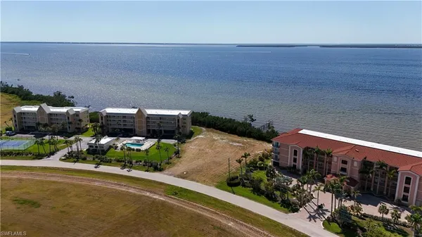 a view of a street with a bench