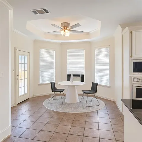 a view of a dining room with furniture