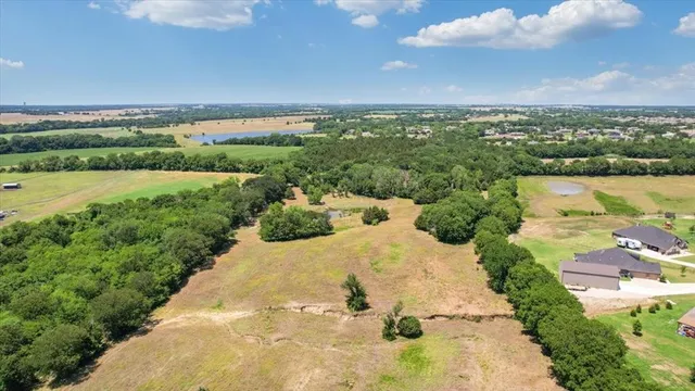 a view of a lake with a city