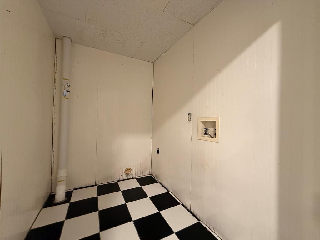200 Sowers Road Blue Ridge, GA 30513 - Photo 12 of 19 a room with a black white checkered floor with a black white checkered floor