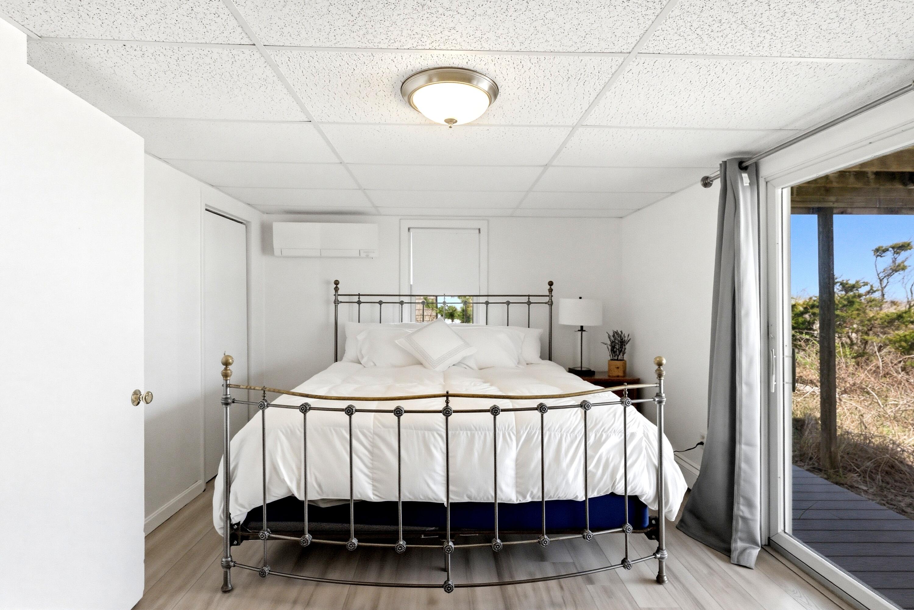 115 Phillips Road Sagamore Beach, MA 02532 - Photo 29 of 35 115 lower level bed slider