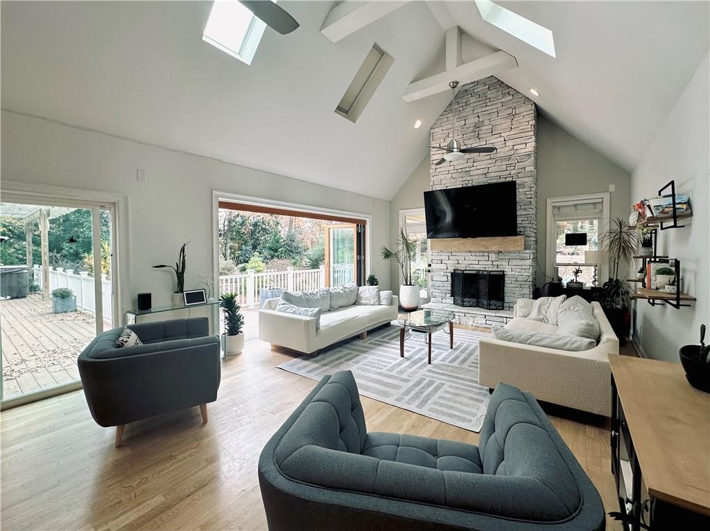 3232 Brookview Road Marietta, GA 30067 - Photo 24 of 86 a living room with furniture a flat screen tv and a fireplace