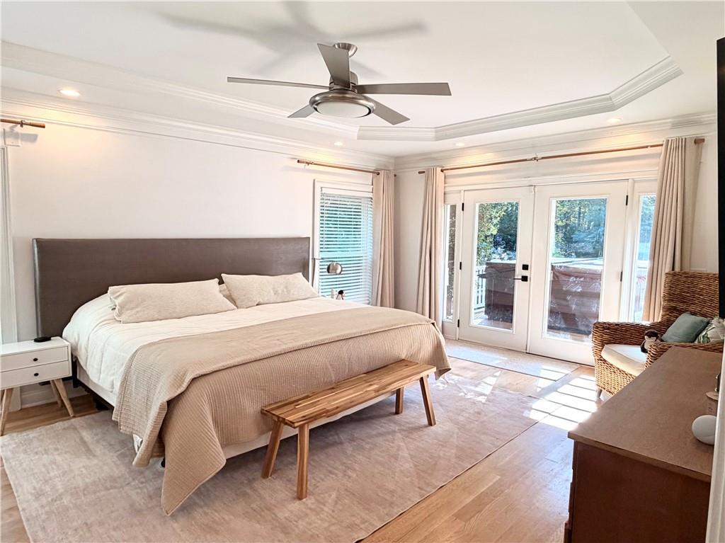 3232 Brookview Road Marietta, GA 30067 - Photo 32 of 86 a bedroom with a bed and glass door