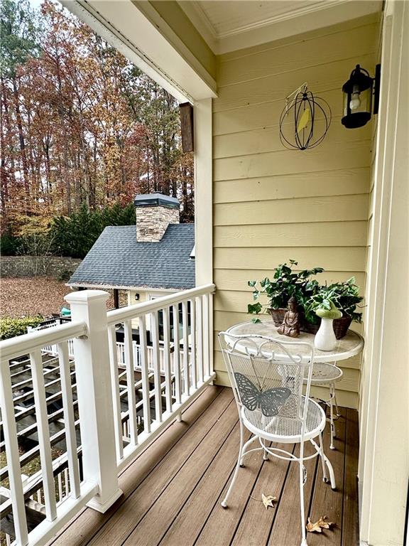 3232 Brookview Road Marietta, GA 30067 - Photo 42 of 86 a view of a chairs and table on the wooden floor