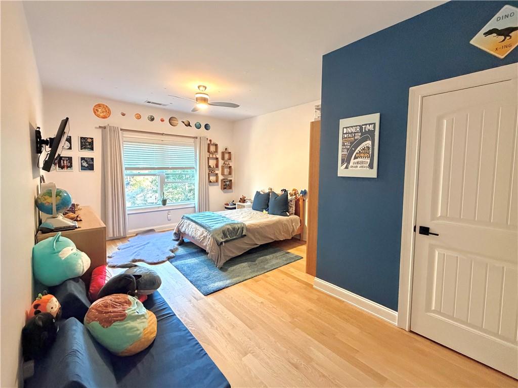 3232 Brookview Road Marietta, GA 30067 - Photo 44 of 86 a bedroom with a bed and a large window