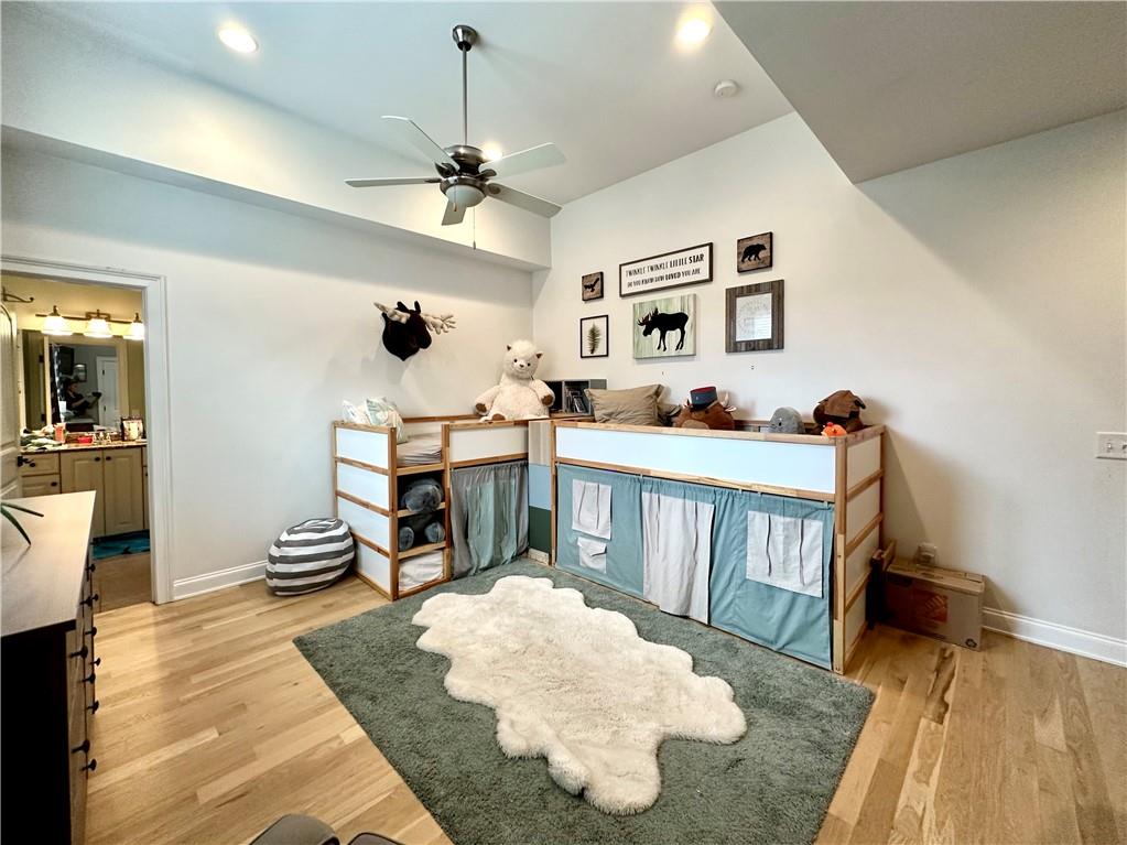 3232 Brookview Road Marietta, GA 30067 - Photo 49 of 86 a living room with furniture and a wooden floor