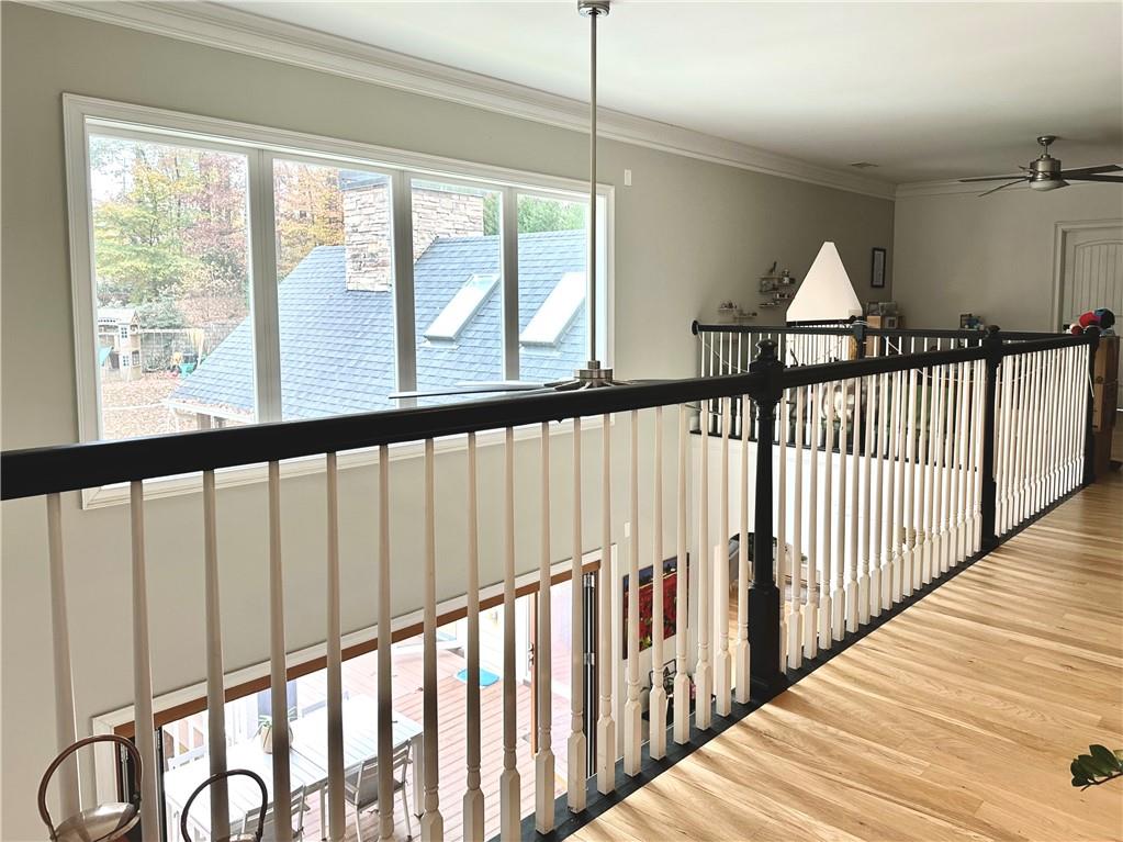 3232 Brookview Road Marietta, GA 30067 - Photo 54 of 86 a view of staircase with lots of windows and wooden floor