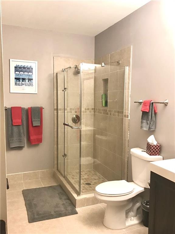 3232 Brookview Road Marietta, GA 30067 - Photo 63 of 86 a bathroom with a toilet and a shower