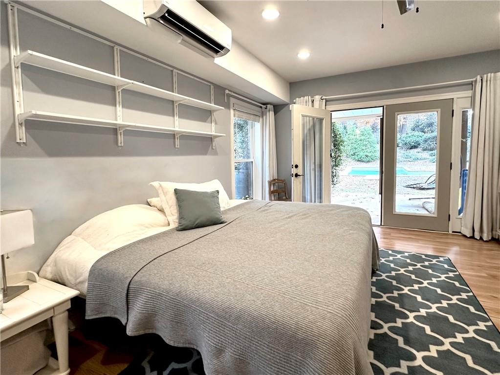 3232 Brookview Road Marietta, GA 30067 - Photo 65 of 86 a bed sitting in a spacious bedroom next to a window