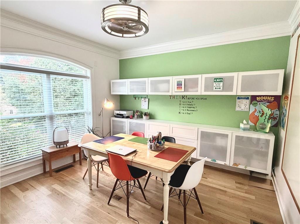 3232 Brookview Road Marietta, GA 30067 - Photo 8 of 86 a view of a dining room with furniture window and outside view