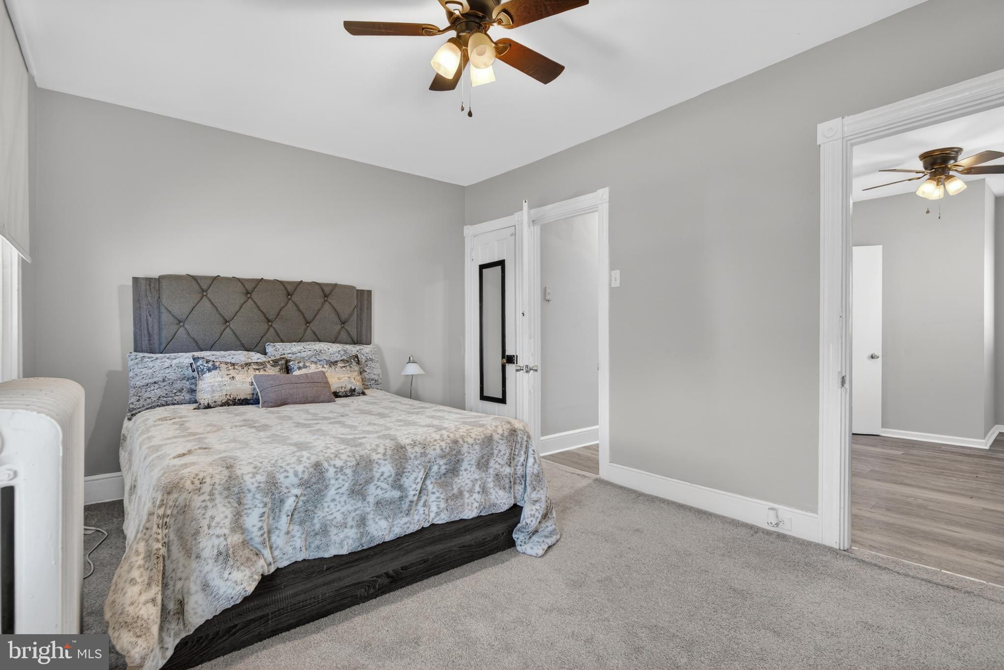 214 Duke Street Ephrata, PA 17522 - Photo 25 of 41 a bedroom with a bed and a ceiling fan