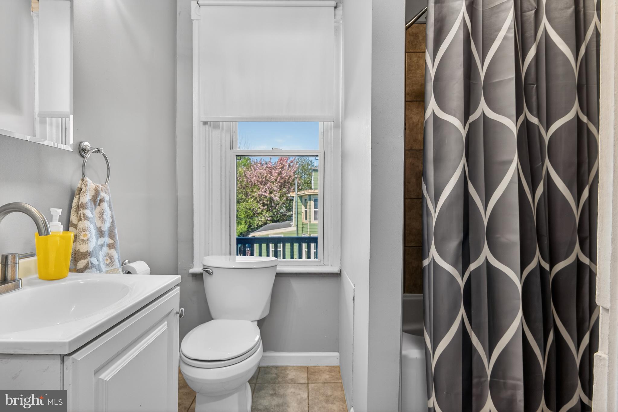 214 Duke Street Ephrata, PA 17522 - Photo 31 of 41 a bathroom with a toilet sink and mirror