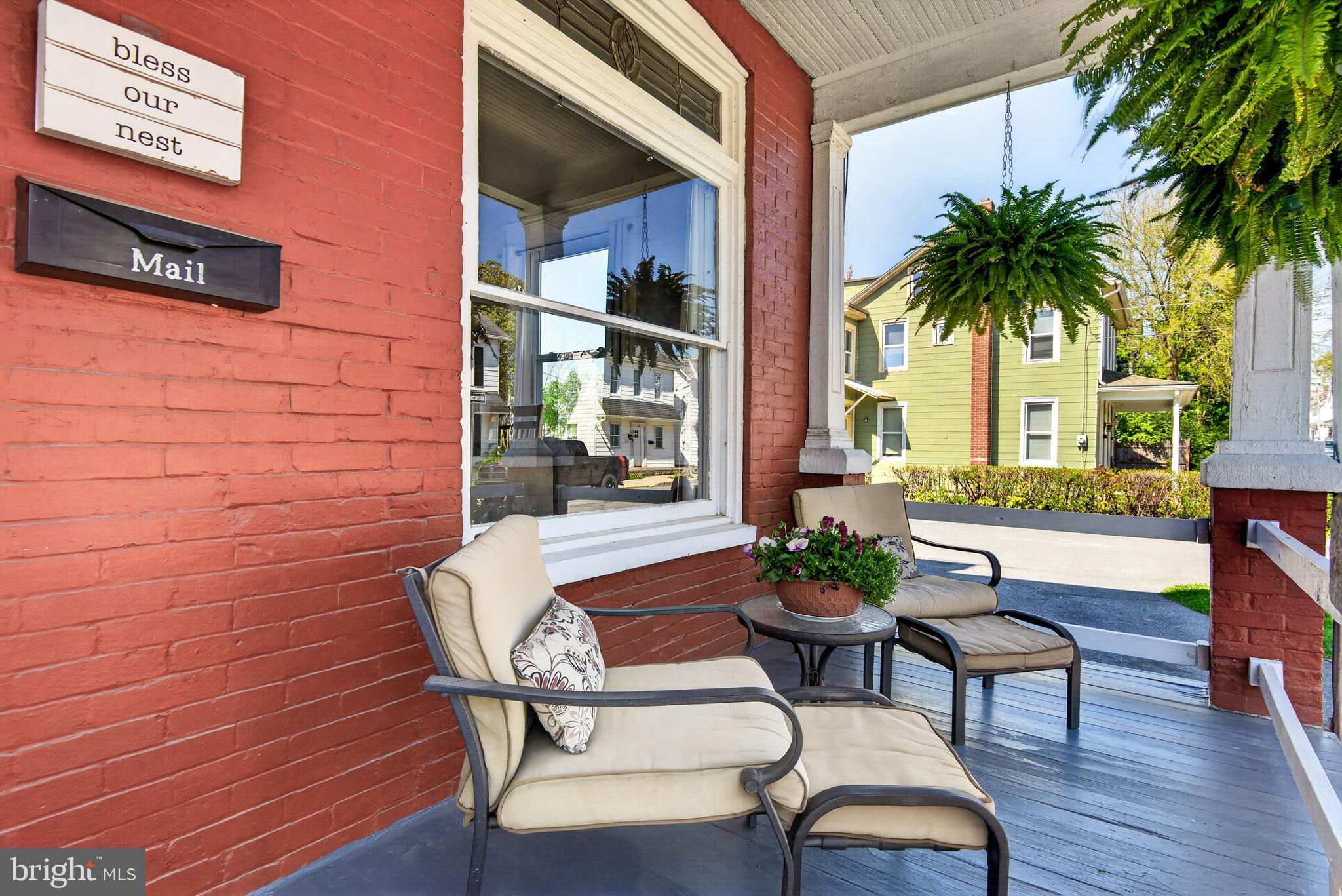 214 Duke Street Ephrata, PA 17522 - Photo 4 of 41 a view of a chairs and table in a patio