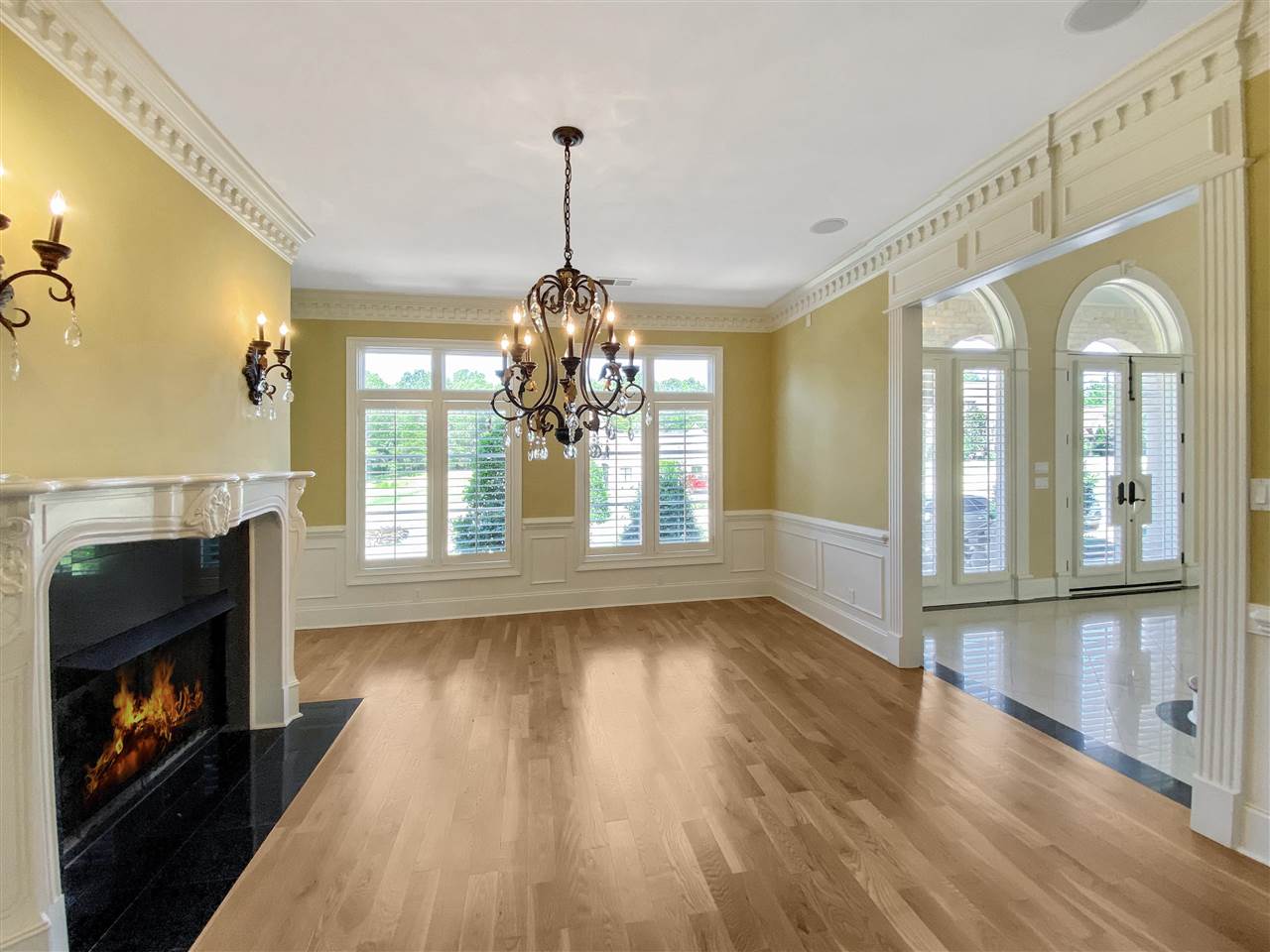 400 Buckland Cove Eads, TN 38028 - Photo 10 of 25 a view of a livingroom with wooden floor and a fireplace