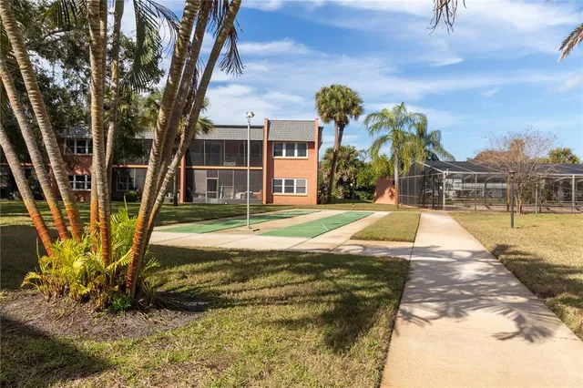 a view of swimming pool with a yard