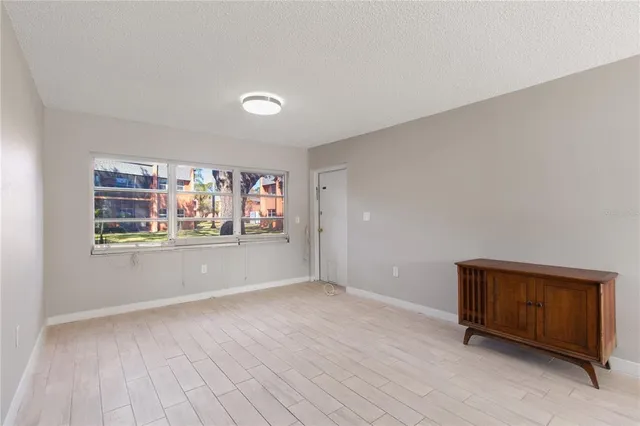 an empty room with window