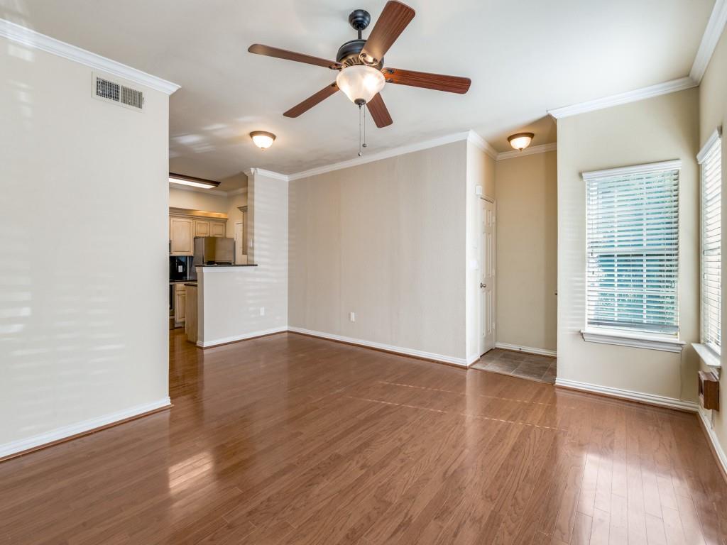 2601 Preston Road, Unit 6109 Plano, TX 75093 - Photo 2 of 16 a view of empty room with wooden floor and fan