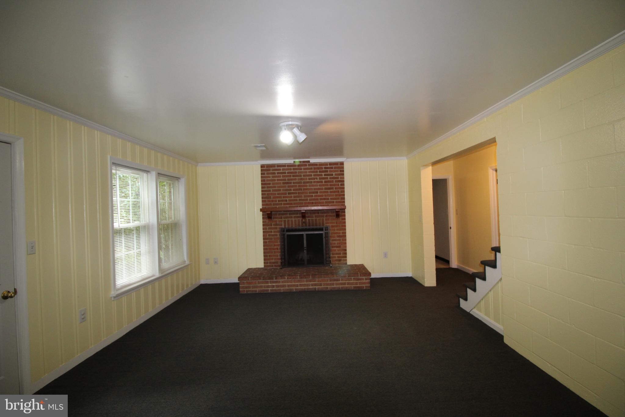 7404 Round Hill Road Frederick, MD 21702 - Photo 35 of 50 Lower level family room