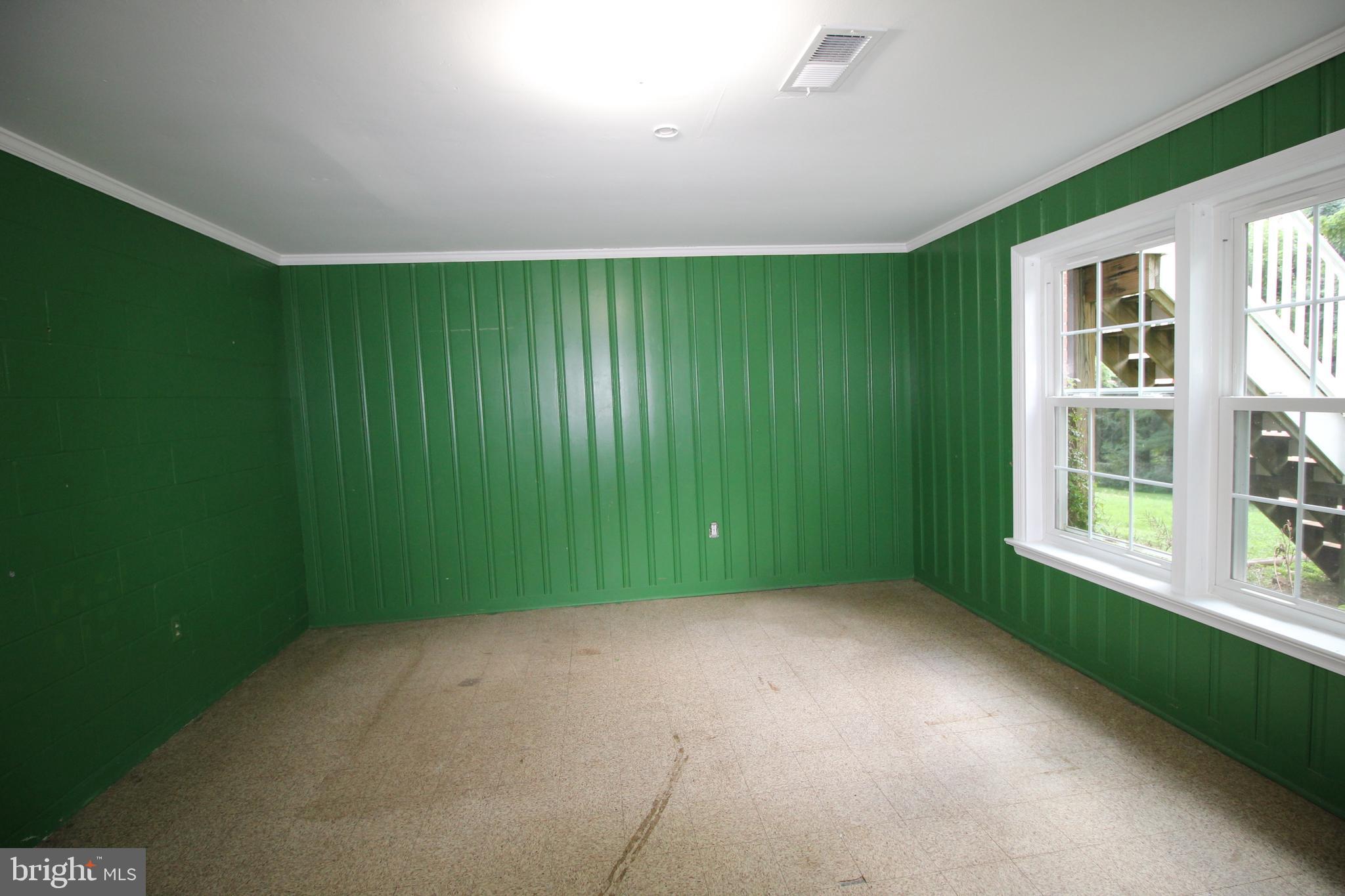 7404 Round Hill Road Frederick, MD 21702 - Photo 37 of 50 Lower level hoppy room. So much natural light