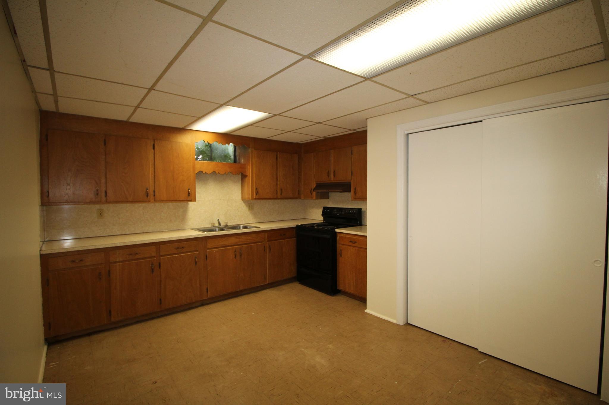 7404 Round Hill Road Frederick, MD 21702 - Photo 40 of 50 Lower level kitchen. Possible in-law suite