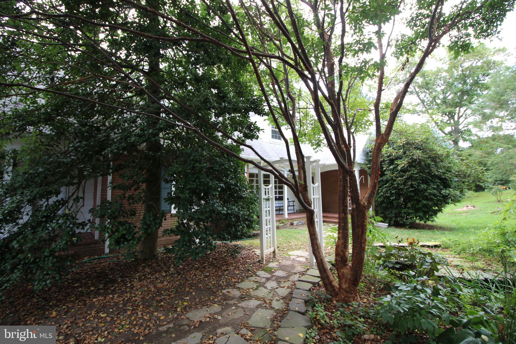 7404 Round Hill Road Frederick, MD 21702 - Photo 5 of 50 Cool, private, shaded front entrance