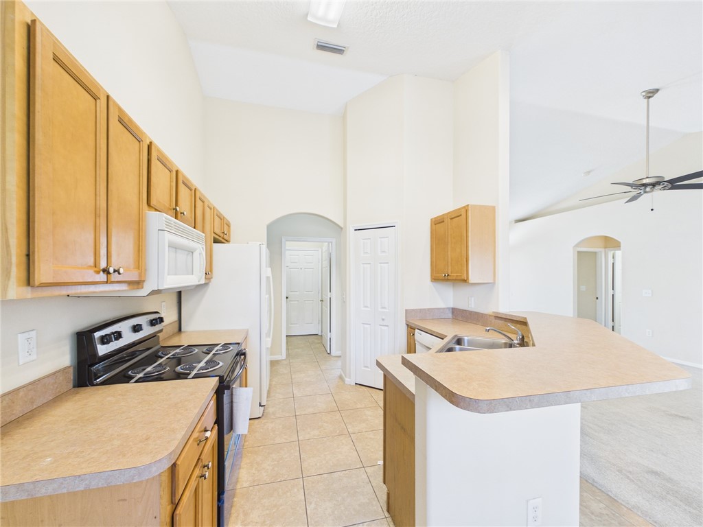 462 Lloyd Street Sebastian, FL 32958 - Photo 12 of 28 a bathroom with a sink a vanity and a mirror