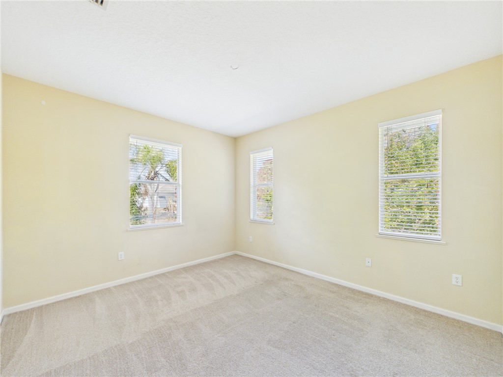 462 Lloyd Street Sebastian, FL 32958 - Photo 17 of 28 an empty room with windows