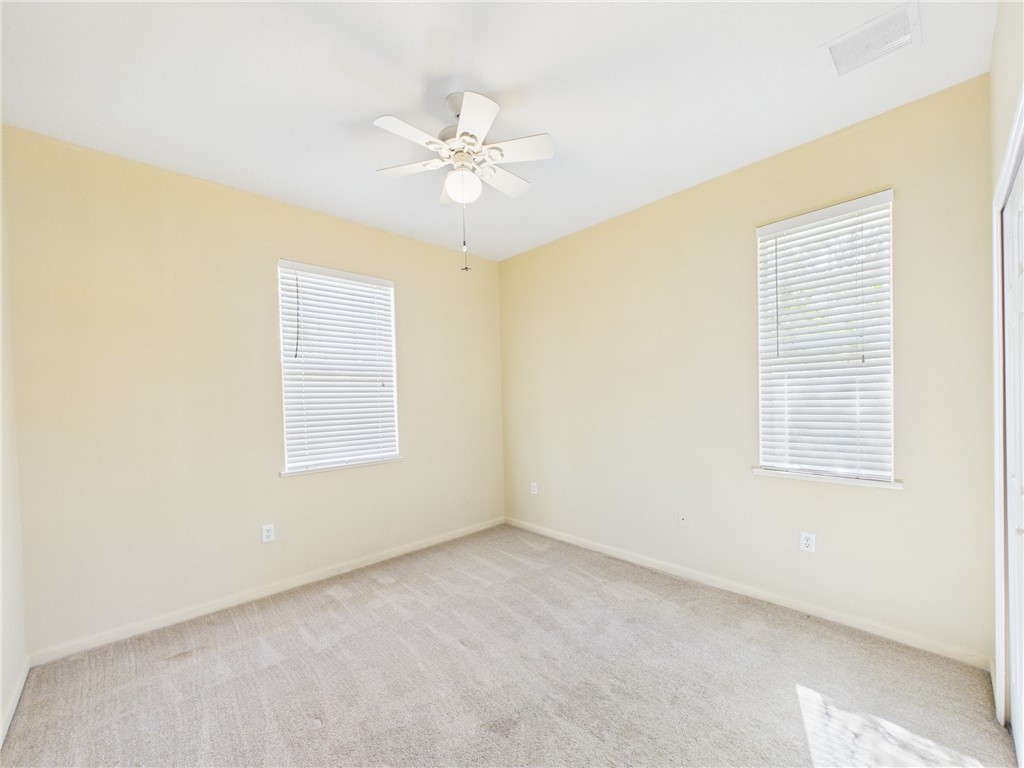 462 Lloyd Street Sebastian, FL 32958 - Photo 22 of 28 a view of an empty room with a window