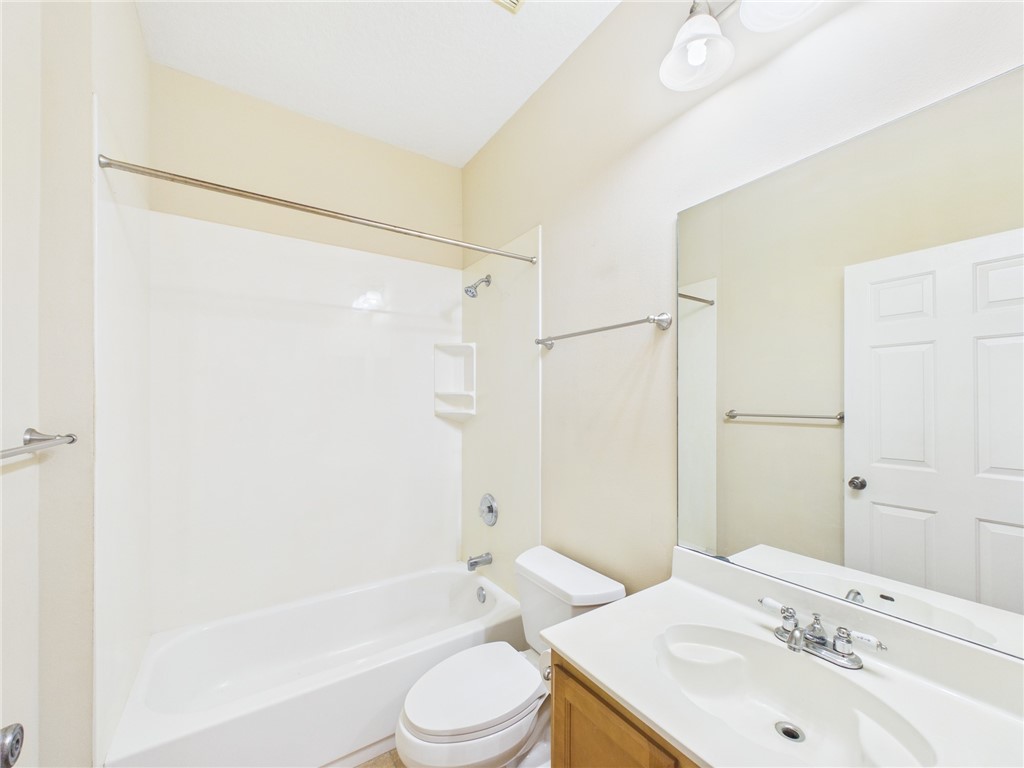 462 Lloyd Street Sebastian, FL 32958 - Photo 24 of 28 a bathroom with a sink a toilet and shower