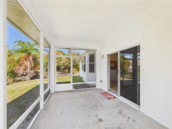 a view of porch with a floor to ceiling window and an outdoor space