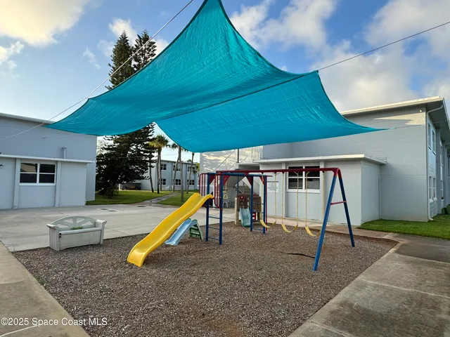 a view of a hall with a slide