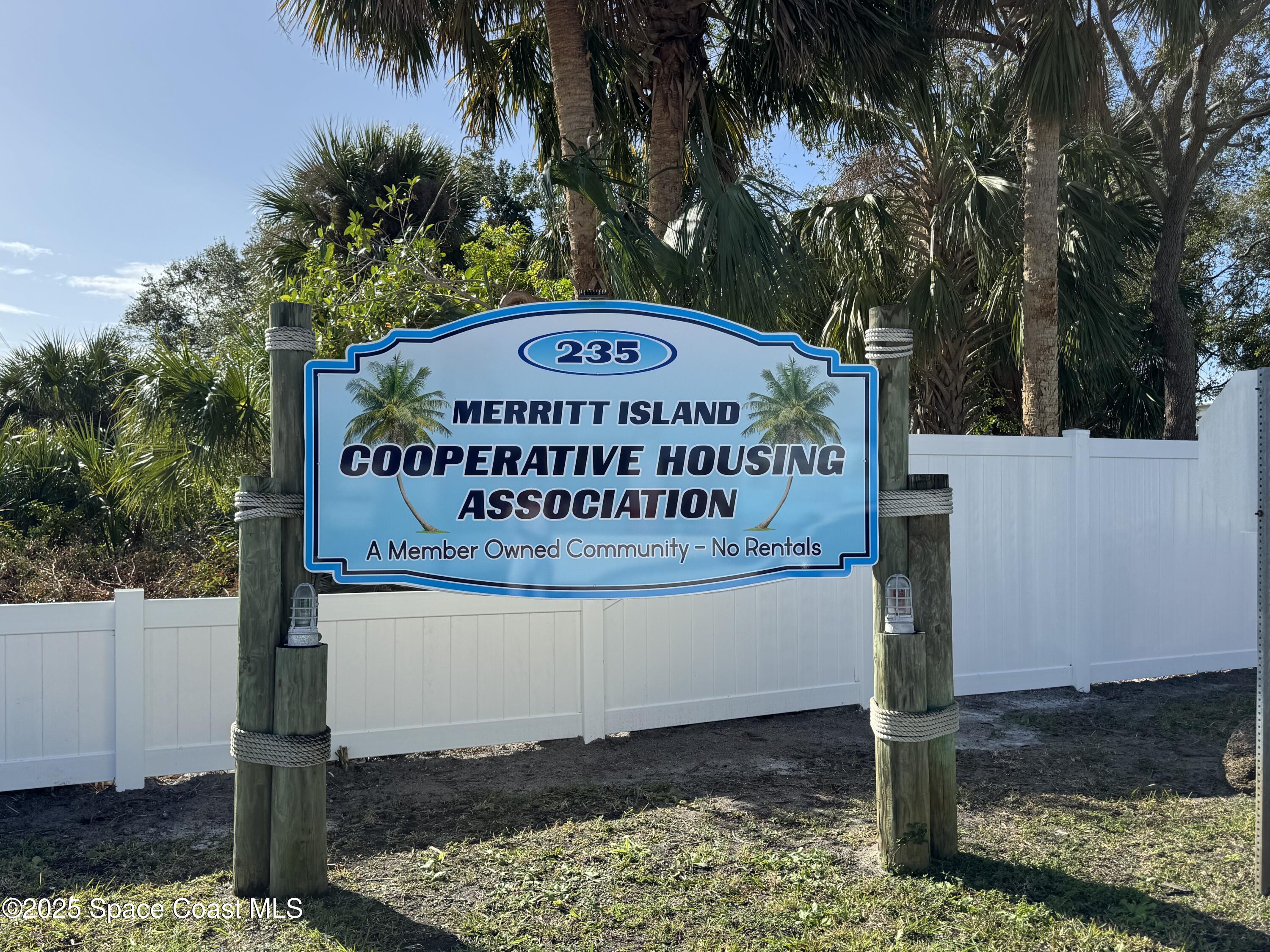 215 Buccaneer Avenue, Unit 3201 Merritt Island, FL 32952 - Photo 26 of 29 a sign on the side of a road