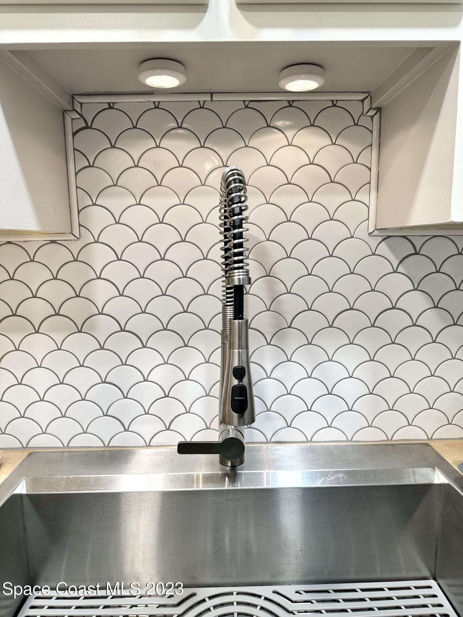 215 Buccaneer Avenue, Unit 3201 Merritt Island, FL 32952 - Photo 8 of 29 a view of a sink