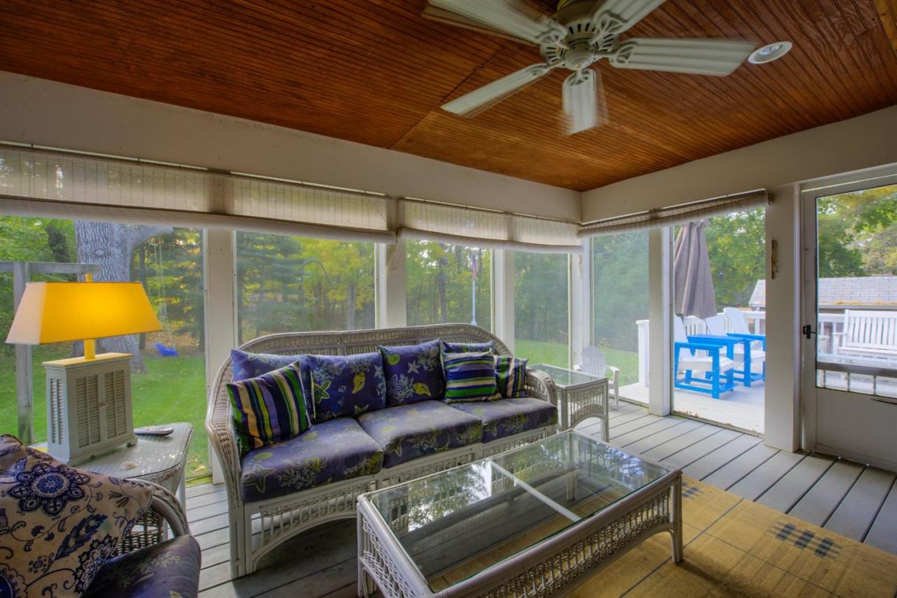 65 Shell Lane Cotuit, MA 02635 - Photo 8 of 32 a living room with furniture and a large window