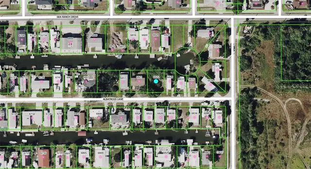 a store area with lots of fruit and vegetables