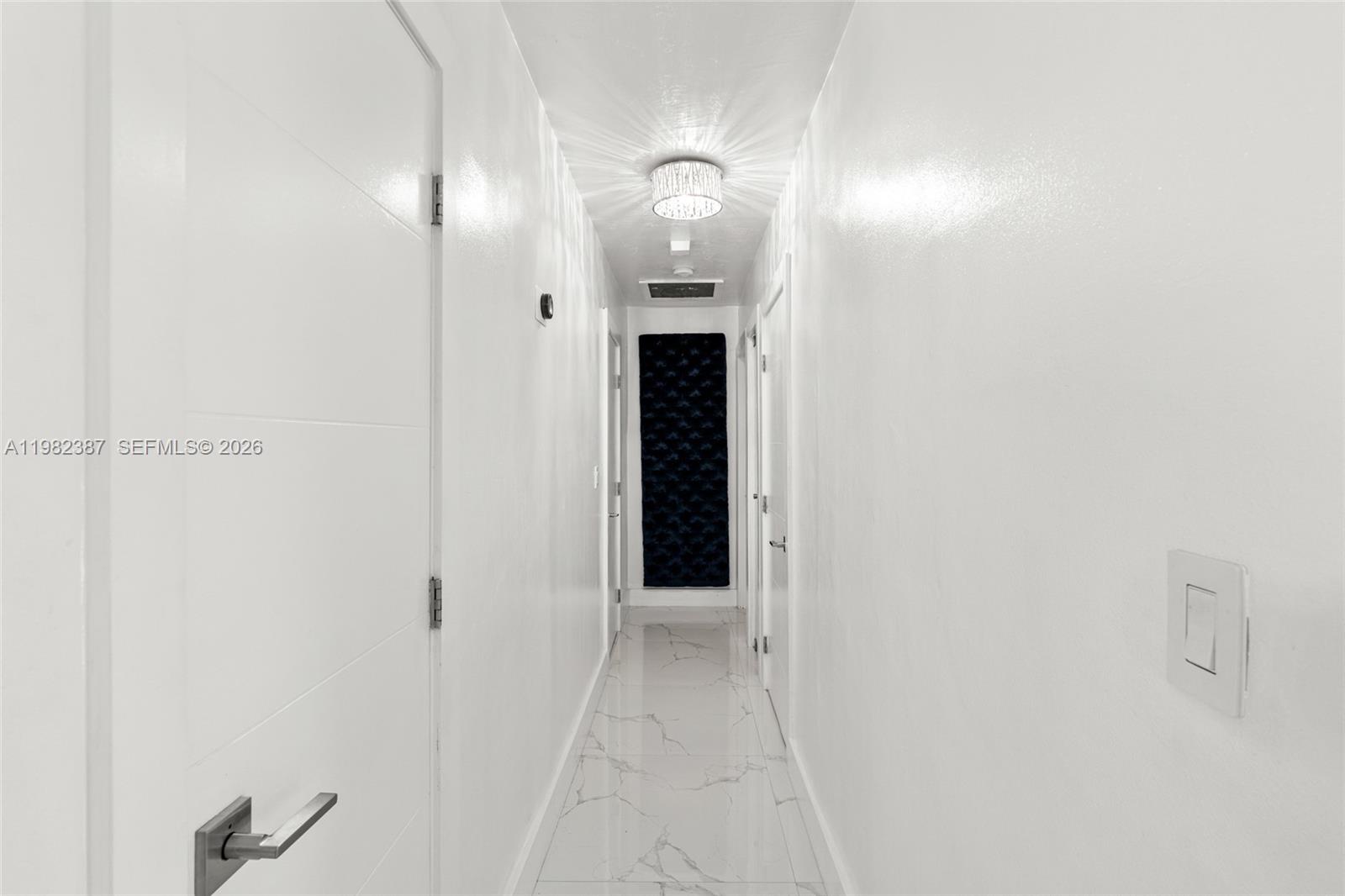 12721 Southwest 47th Street Miami, FL 33175 - Photo 17 of 47 a view of a hallway with closet