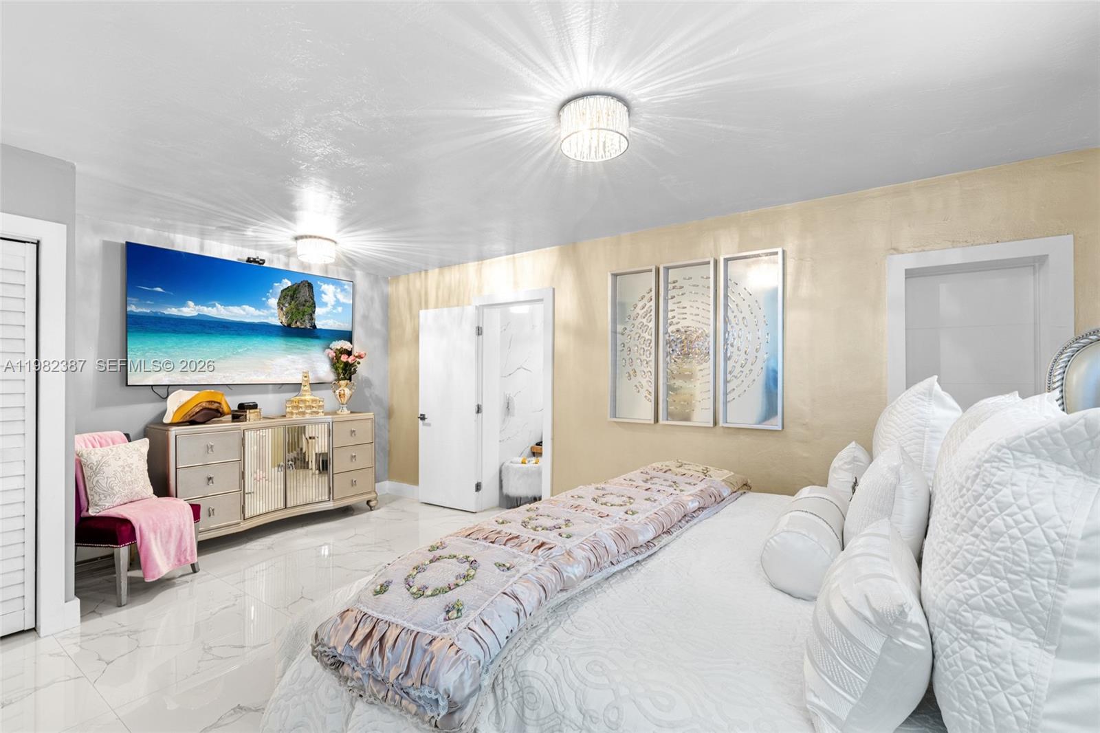 12721 Southwest 47th Street Miami, FL 33175 - Photo 20 of 47 a bedroom with bed and a flat tv screen