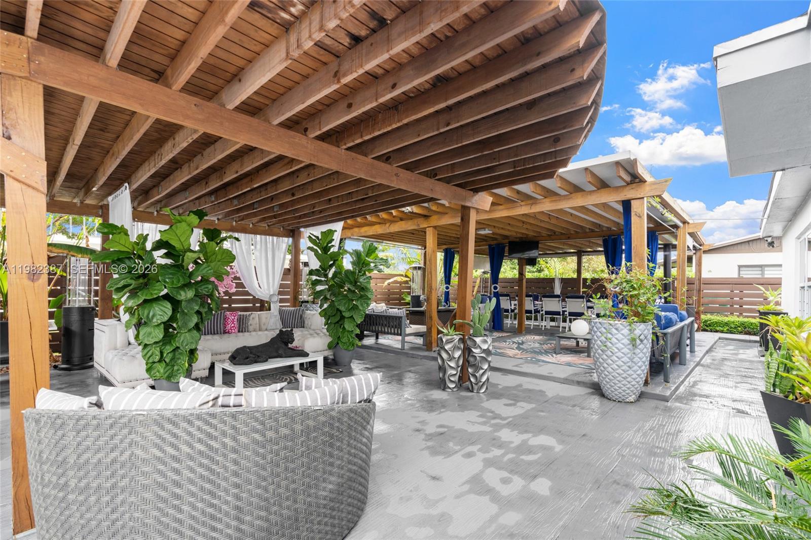 12721 Southwest 47th Street Miami, FL 33175 - Photo 35 of 47 a view of a chairs and tables in patio