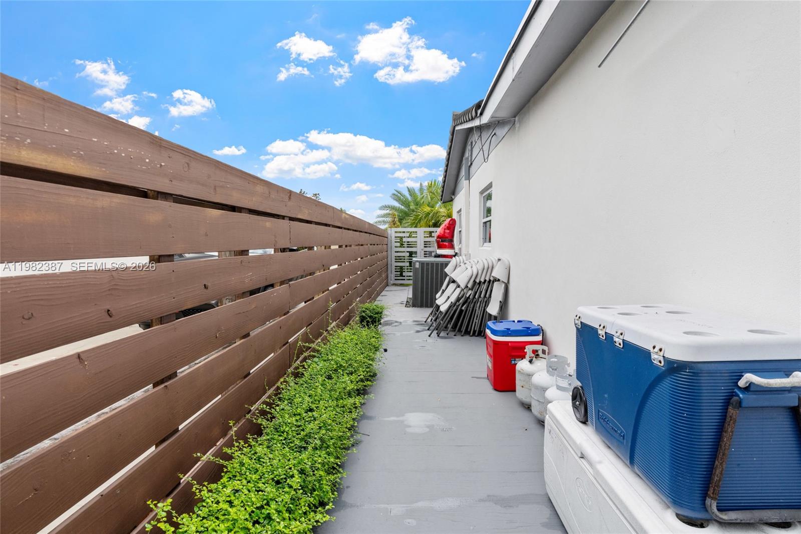 12721 Southwest 47th Street Miami, FL 33175 - Photo 39 of 47 a view of a patio with couches and potted plants