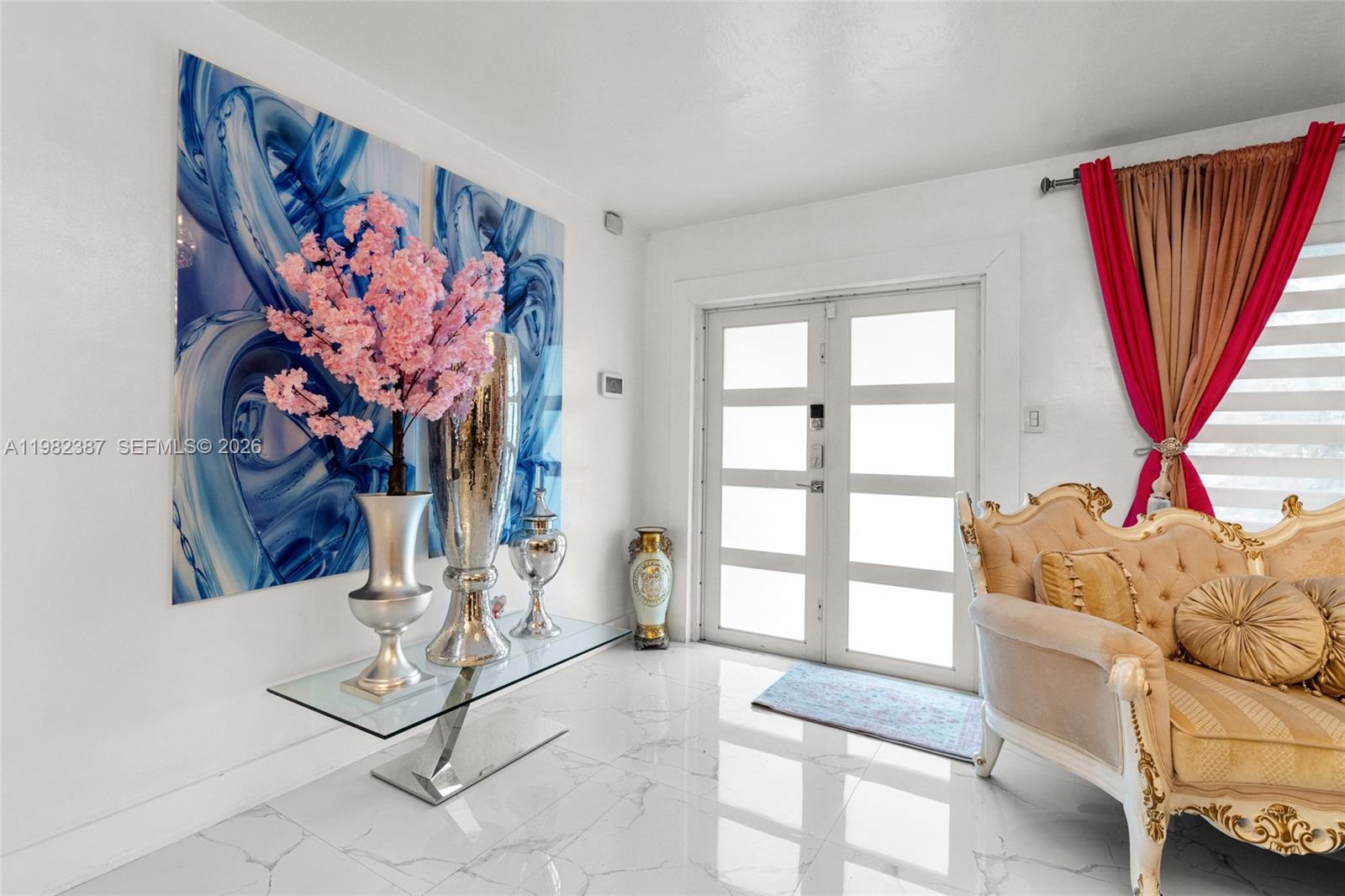 12721 Southwest 47th Street Miami, FL 33175 - Photo 7 of 47 a living room with furniture and a window