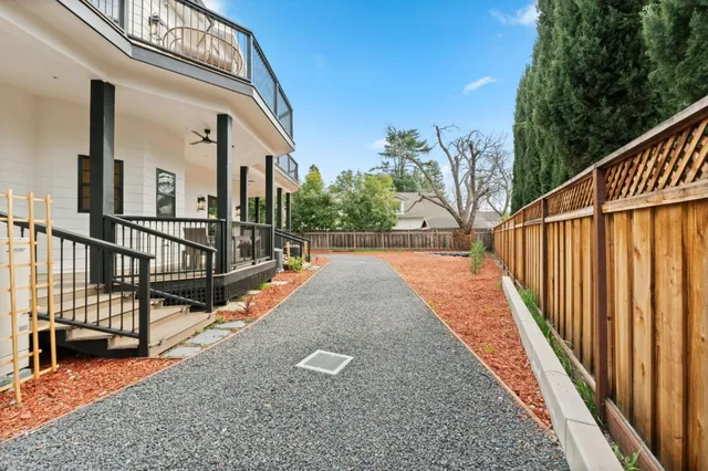 a view of balcony with couch and wooden floor