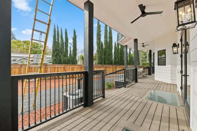 a bathroom with a double vanity sink and mirror