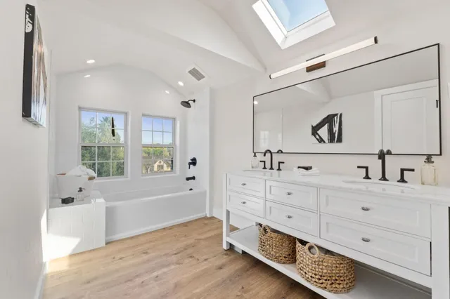 a view of a balcony with wooden floor