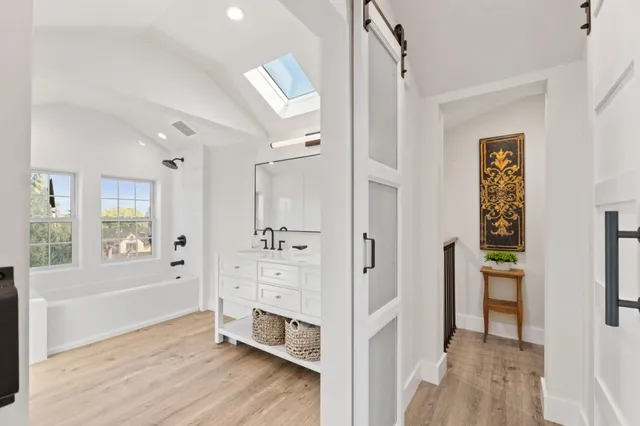 a view of a balcony with wooden floor