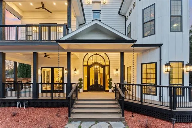 a view of a large building with a small yard