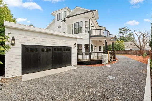 a view of a house with wooden stairs