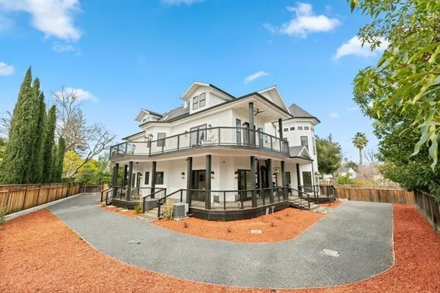a view of a balcony with wooden floor