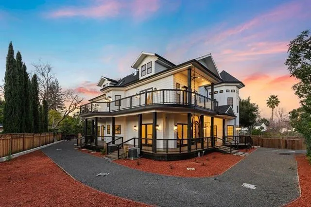 a view of a balcony with wooden floor