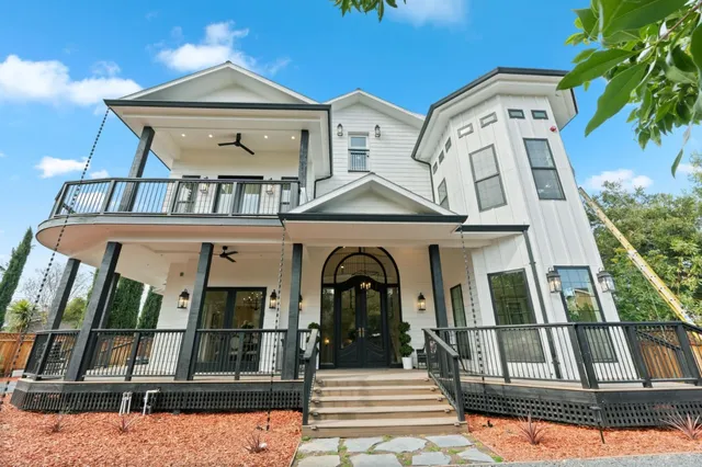 a view of a chairs on the roof deck